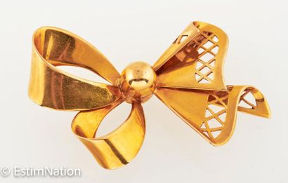 BROCHE NOEUD EN OR 
18K (750/°°) yellow gold...