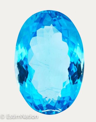 TOPAZE PESANT 23.54 CARAT 
Faceted oval topaz...