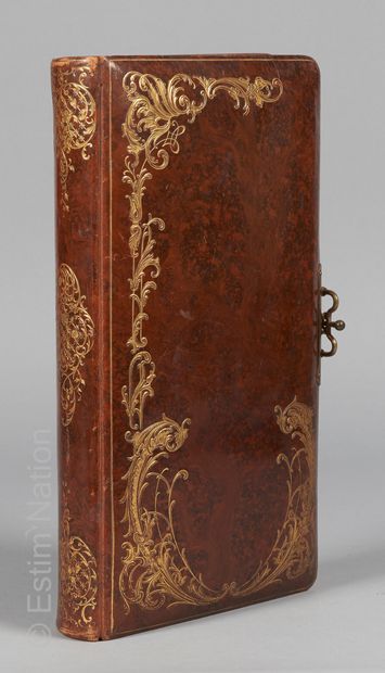 PHOTOGRAPHIES
Album in speckled leather with...