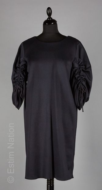 COS
TWO oversized DRESSES : the first one...