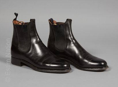 J. M. WESTON
PAIR OF BOOTS in black elastic...
