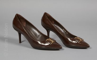 LOUIS VUITTON
PAIR OF SLIPPERS in chocolate...