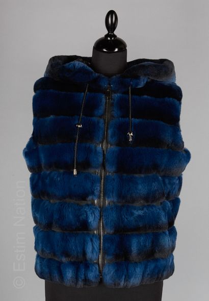 PLUS 39
Blue and black glossy Orylag rabbit...