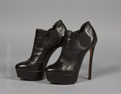 CASADEI
Pair of black leather shoes with...