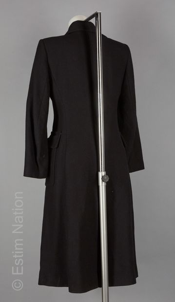 TARA JARMON
Coat in black wool blend gabardine,...