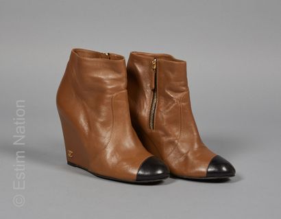 CHANEL
PAIR OF semi-compensated boots in...