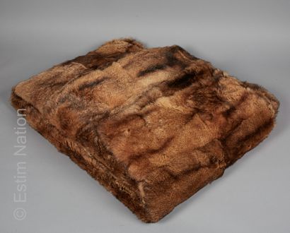 ANONYME
PLAID made of American rat and lined...