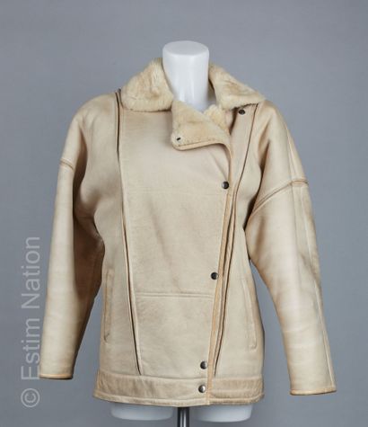 ANONYME Vintage 
BOMBERS en peau lainée retournée...