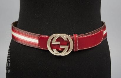 GUCCI
CEINTURE en box bordeaux et sangles,...