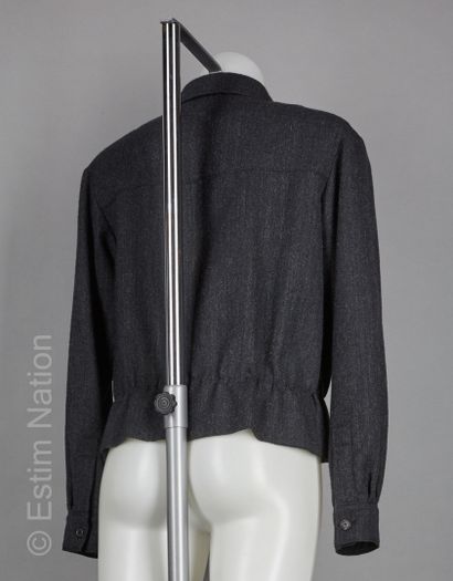 LOUIS VUITTON
VESTE en laine et alpaga figurant...