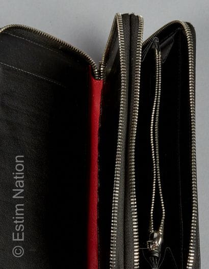 DIOR HOMME
PORTEFEUILLE COMPAGNON en toile...