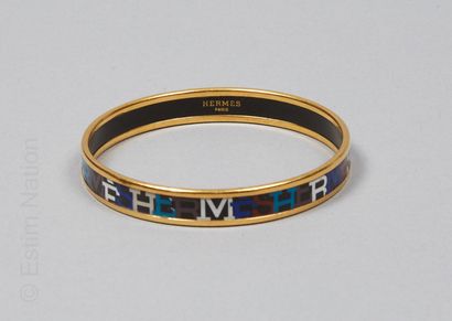 HERMES
JONC en métal plaqué or émaillé du...