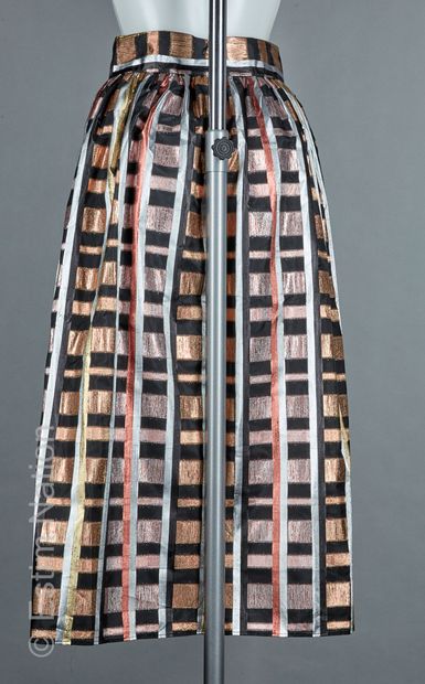 SEZANE
LONGUE JUPE en lurex métallisé figurant...