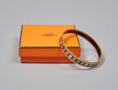 HERMES
JONC en métal plaqué or émaillé marron...