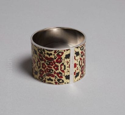 Christian LACROIX
MANCHETTE en métal argenté...