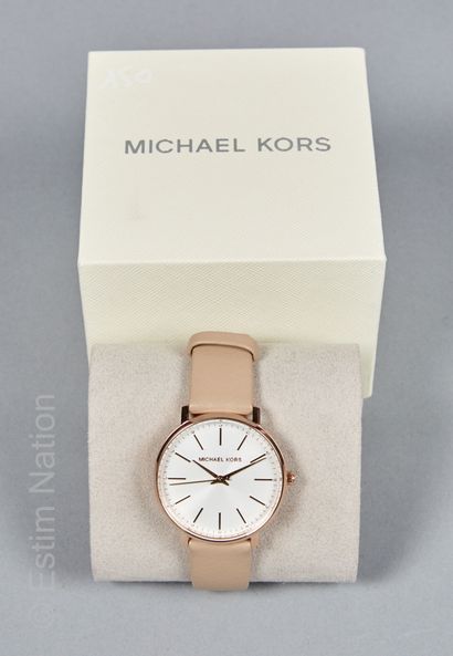 Michael KORS
MONTRE en métal rosé , fond...
