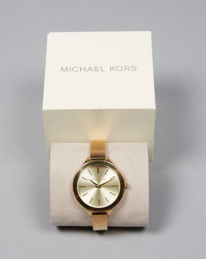 Michael KORS
MONTRE en métal doré partiellement...