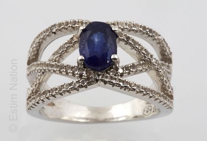 BAGUE ARGENT, SAPHIR ET TOPAZES
Silver ring...