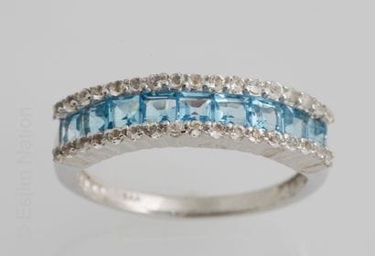 BAGUE ARGENT, TOPAZES BLEUES ET ZIRCONS
Silver...