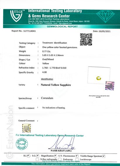 UN SAPHIR JAUNE SUR PAPIER ET CERTIFICAT
A...