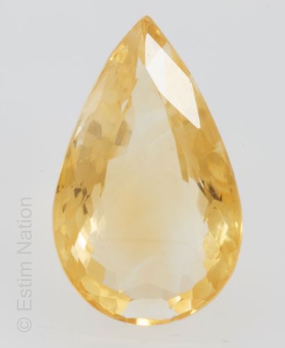 Citrine sur papier 
Une citrine facettée...