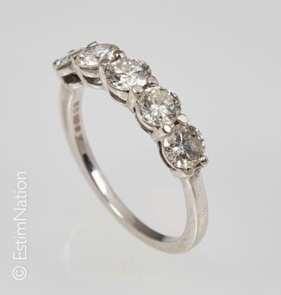 BAGUE OR DIAMANTS
Garter ring in 18K (750°/00)...