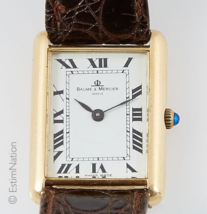 BAUME ET MERCIER
Tank style watch in 18k...