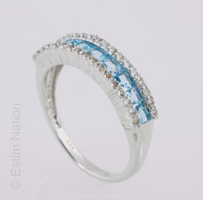BAGUE ARGENT, TOPAZES BLEUES ET ZIRCONS
Silver...