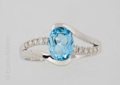 BAGUE OR, TOPAZE ET DIAMANTS
Ring in white...