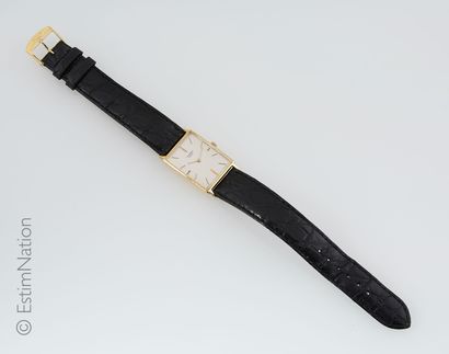 UNIVERSAL GENEVE
Tank style watch in 18k...