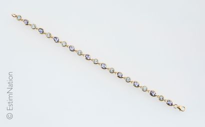 BRACELET VERMEIL, TANZANITES ET TOPAZES BLEUES
Bracelet...