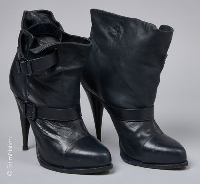 GIVENCHY
PAIR OF BOOTS in lambskin with black...