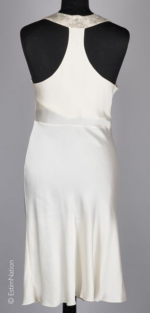 LULU
ROBE de cocktail en soie ivoire, encolure...