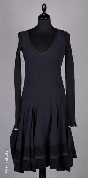 MARITHE FRANCOIS GIRBAUD
ROBE en jersey polyester...