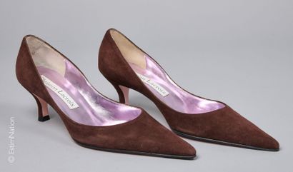 CHRISTIAN LACROIX
PAIRE D'ESCARPINS en peau...