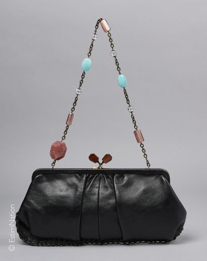 BABE
TWO BAGS of purse form in black leather...