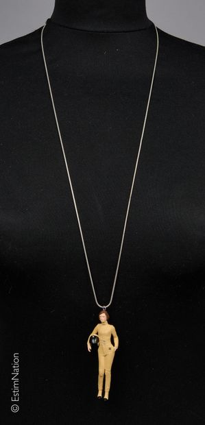 CHANEL
Composite pendant featuring Keira...