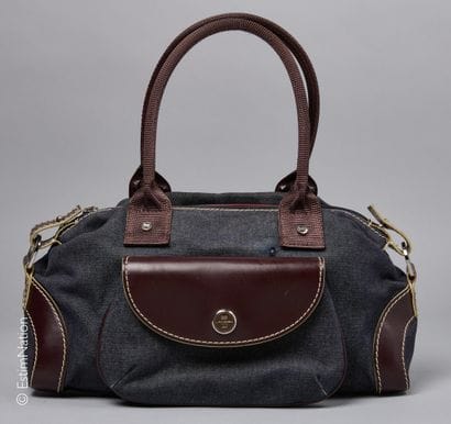 LANCEL
SAC bowling en toile façon denim brut...
