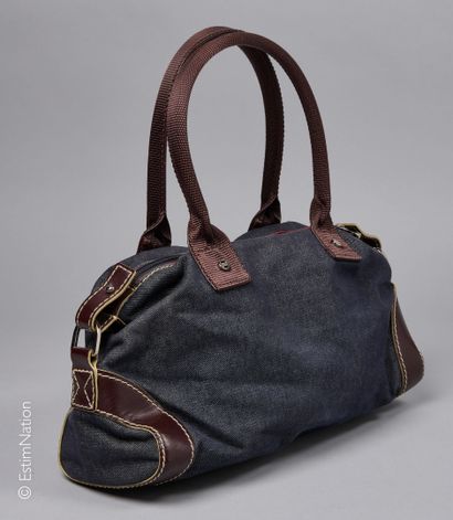 LANCEL
SAC bowling en toile façon denim brut...