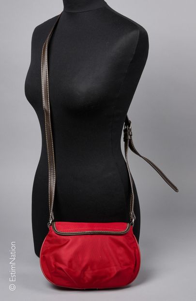 LANCEL
SMALL BAG in garnet nylon and chocolate...