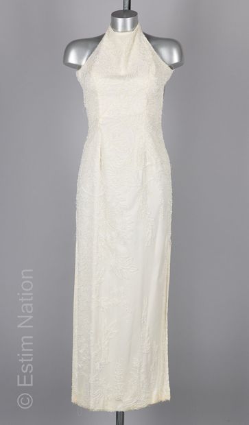 CACHE
ROBE en soie blanche reperlée à la...