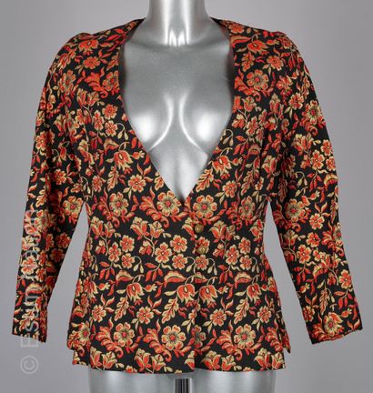 ANONYME
VESTE en laine noire brochée d'un...