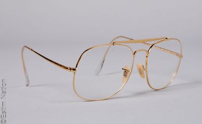 RAY BAN
Pair of gilded metal eyeglass frames,...