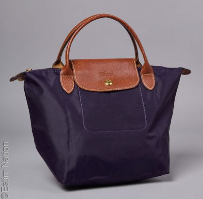 LONGCHAMP
THREE BAGS folded in nylon and...