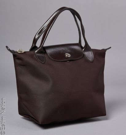 LONGCHAMP
THREE BAGS folded in nylon and...