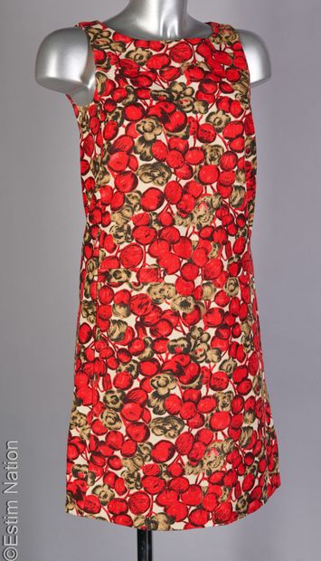 TARA JARMON
TWO DRESSES: the first long with...