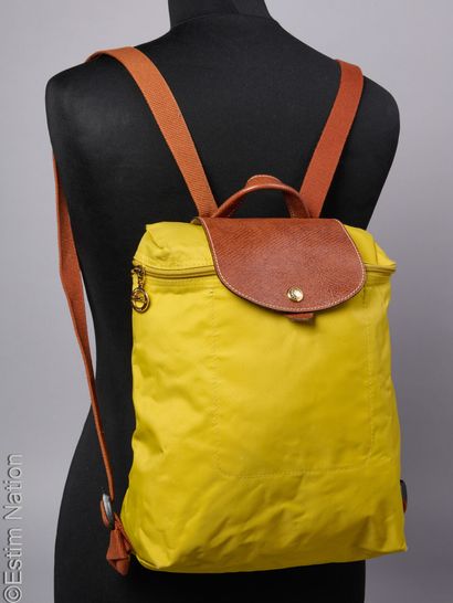 LONGCHAMP
THREE BAGS folded in nylon and...