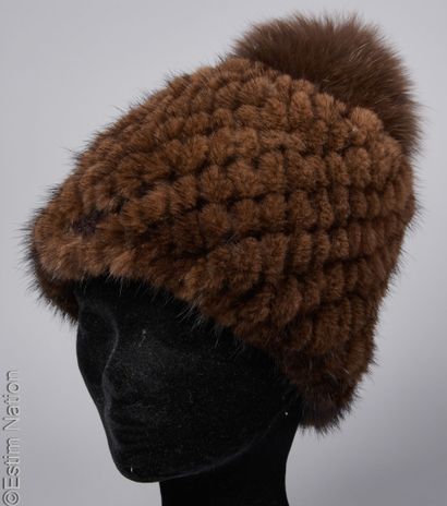 MAX MARA
Knitted mink hat with matching fox...