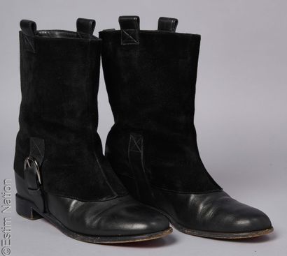 CHRISTIAN LOUBOUTIN
PAIRE DE BOTTINES d'inspiration...