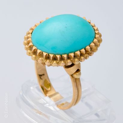 BAGUE OR JAUNE CABOCHON DE TURQUOISE
Bague...